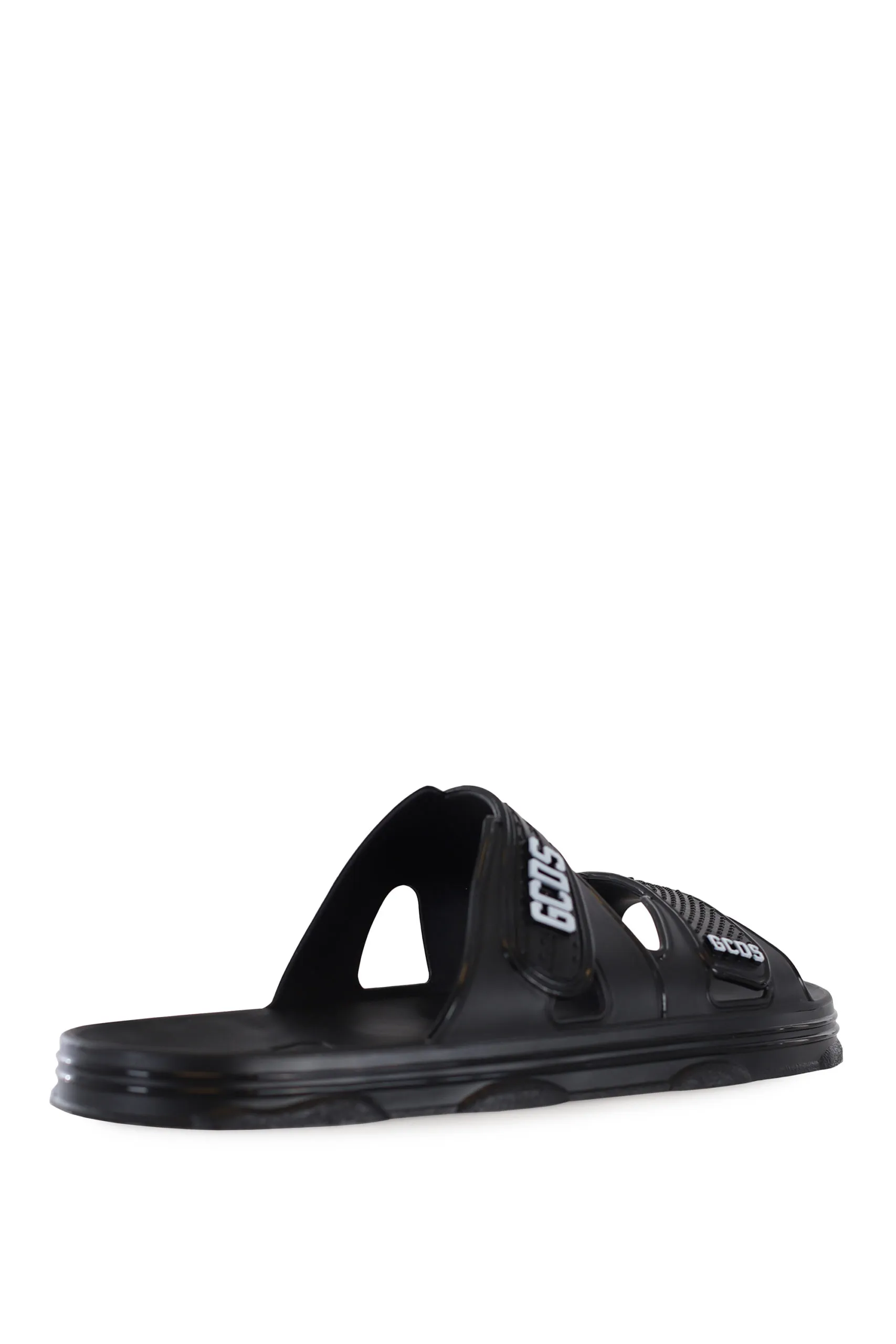 Chanclas negras de goma con logo blanco