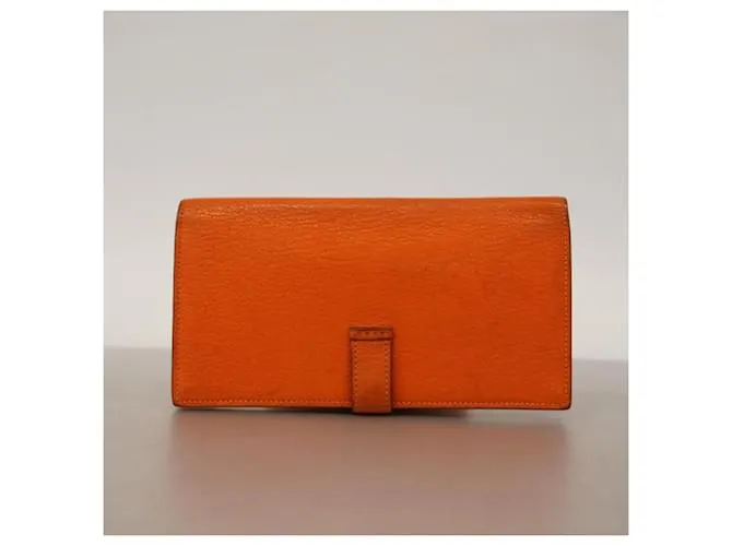 Monedero de cuero Chevre Mysore de Hermès en naranja 