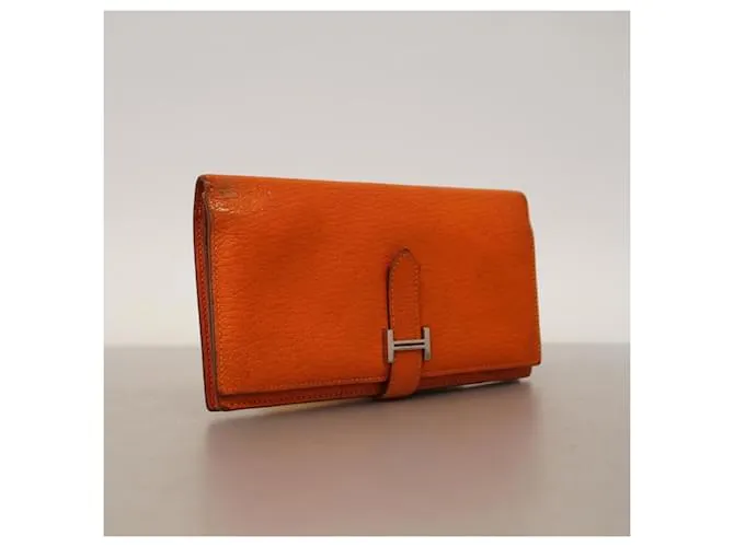 Monedero de cuero Chevre Mysore de Hermès en naranja 