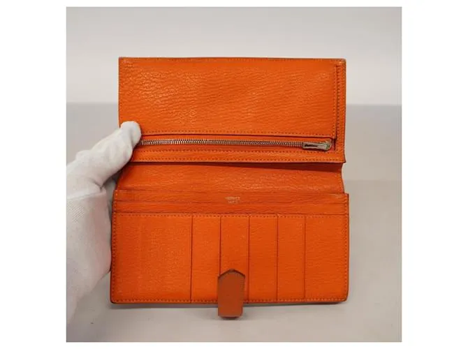 Monedero de cuero Chevre Mysore de Hermès en naranja 