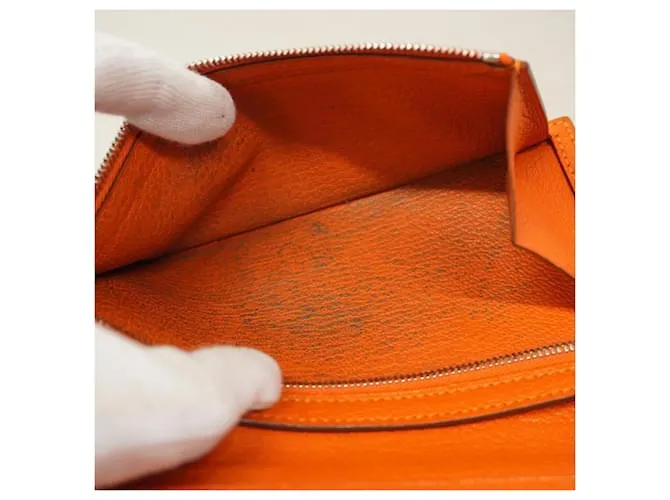 Monedero de cuero Chevre Mysore de Hermès en naranja 