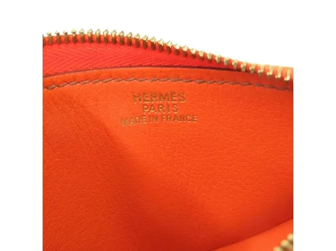 Monedero de cuero naranja Hermès Fruit Castaño 