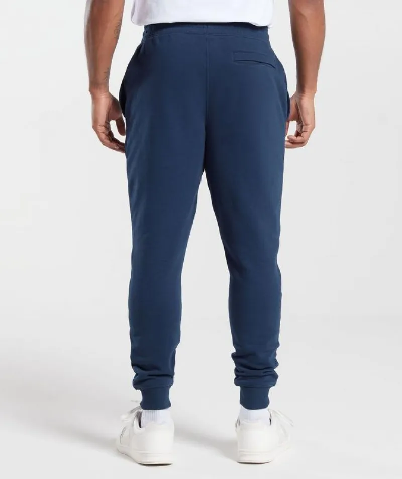 Pantalones Gymshark Crest Joggers Azul Marino | 486709-CVO